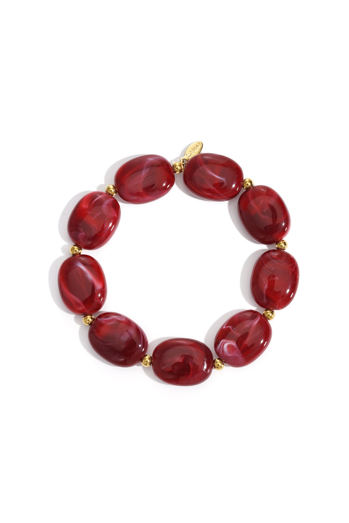 perlenarmband mit ovalen und goldenen perlen