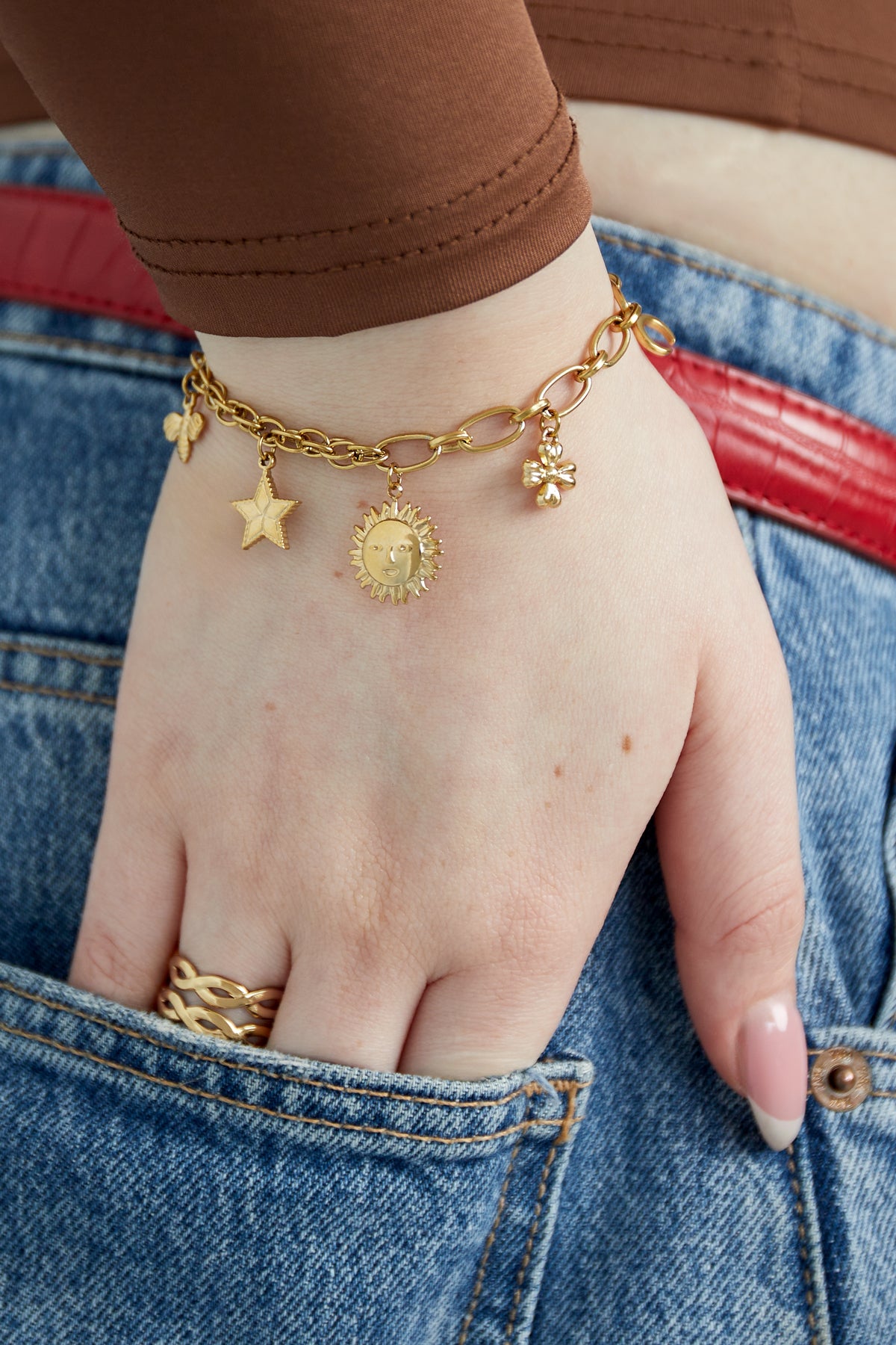 armband mit himmlischen anhängern - goldfarben