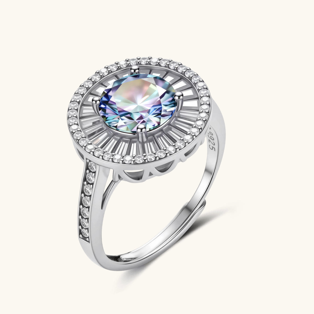 close-up of sterling silver halo ring with round rainbow moissanite center stone surrounded by baguette-cut stones