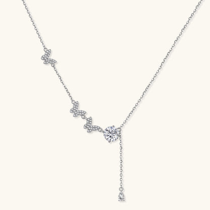 Sterling silver Y-shaped necklace with butterfly charms and brilliant moissanite stone with teardrop pendant