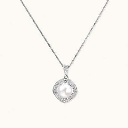 Cushion-shaped double halo pendant with 10mm freshwater pearl center on rhodium-plated sterling silver chain