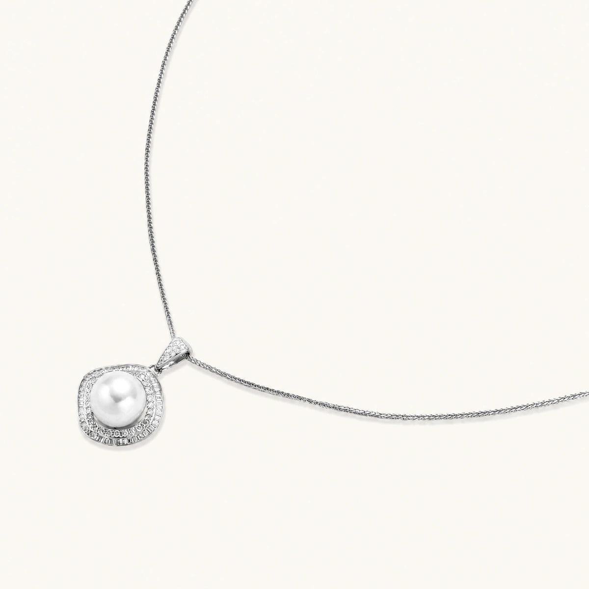 cushion-shaped double halo pendant with 10mm freshwater pearl center on rhodium-plated sterling silver chain