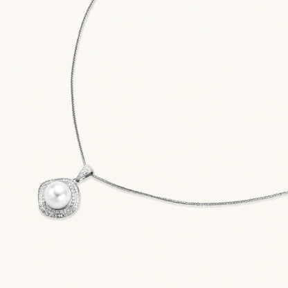 Cushion-shaped double halo pendant with 10mm freshwater pearl center on rhodium-plated sterling silver chain