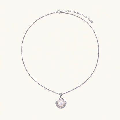 Cushion-shaped double halo pendant with 10mm freshwater pearl center on rhodium-plated sterling silver chain