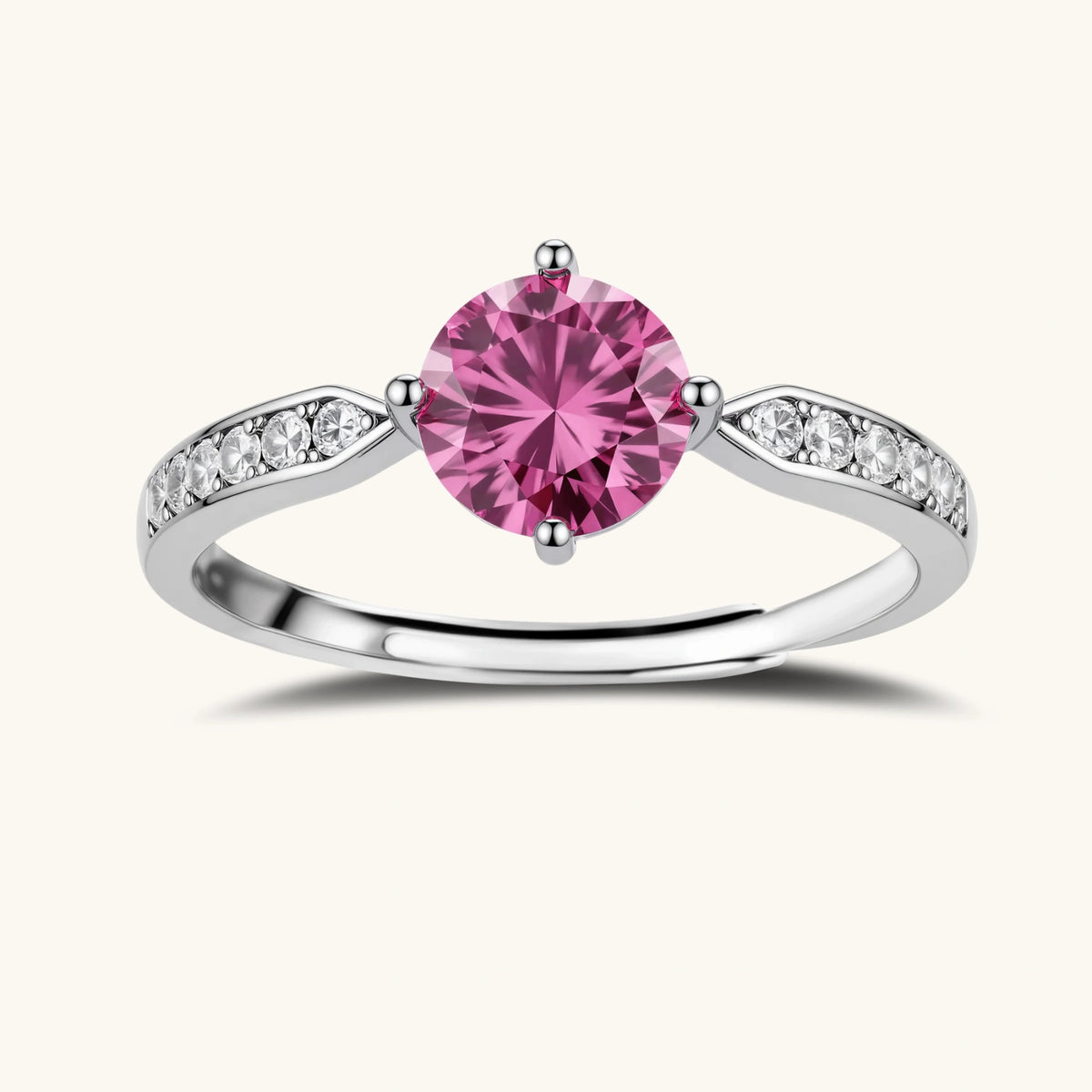 brilliant pink moissanite ring in sterling silver 4-prong setting with accent stones on adjustable band