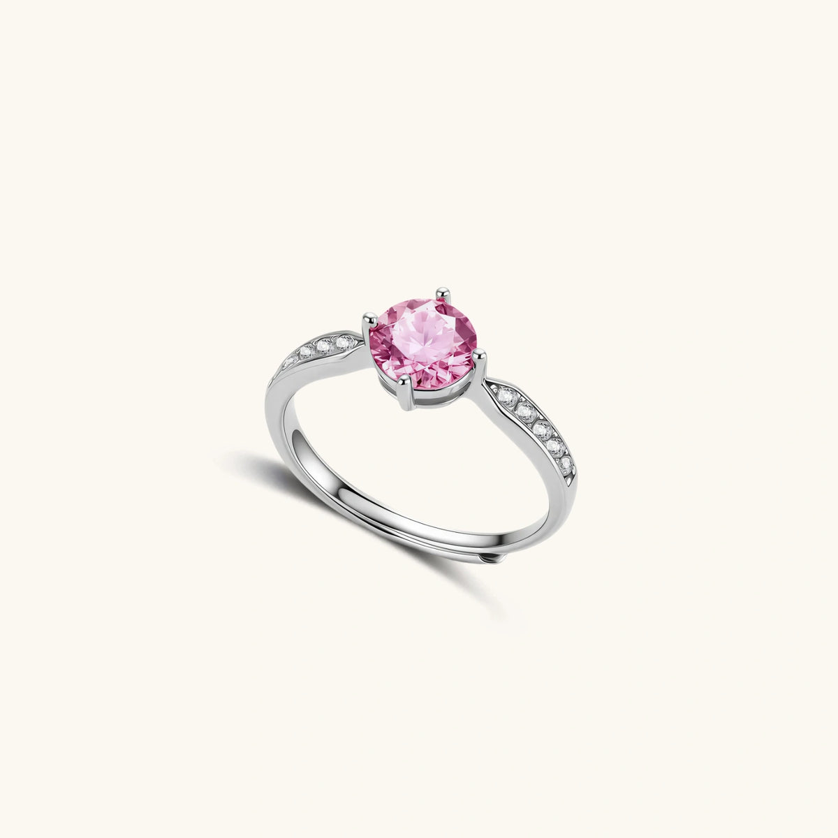 brilliant pink moissanite ring in sterling silver 4-prong setting with accent stones on adjustable band