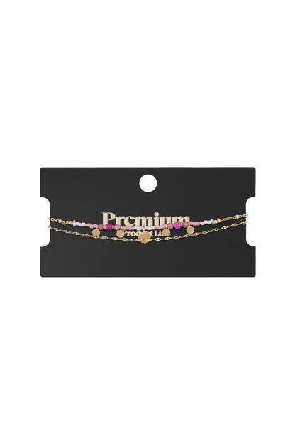 Armband mit rosa Anhängern - Goldfarben