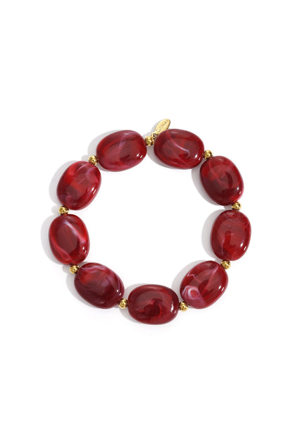 Perlenarmband mit ovalen und goldenen Perlen