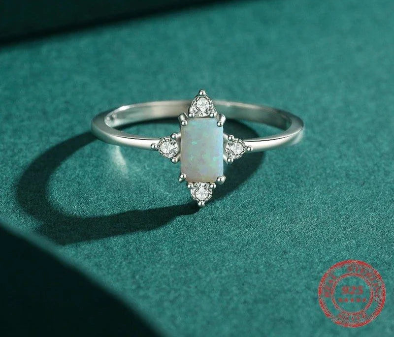 finityzoneluxus ring aus 925er silber mit opal – glanzvolle krone für frauen